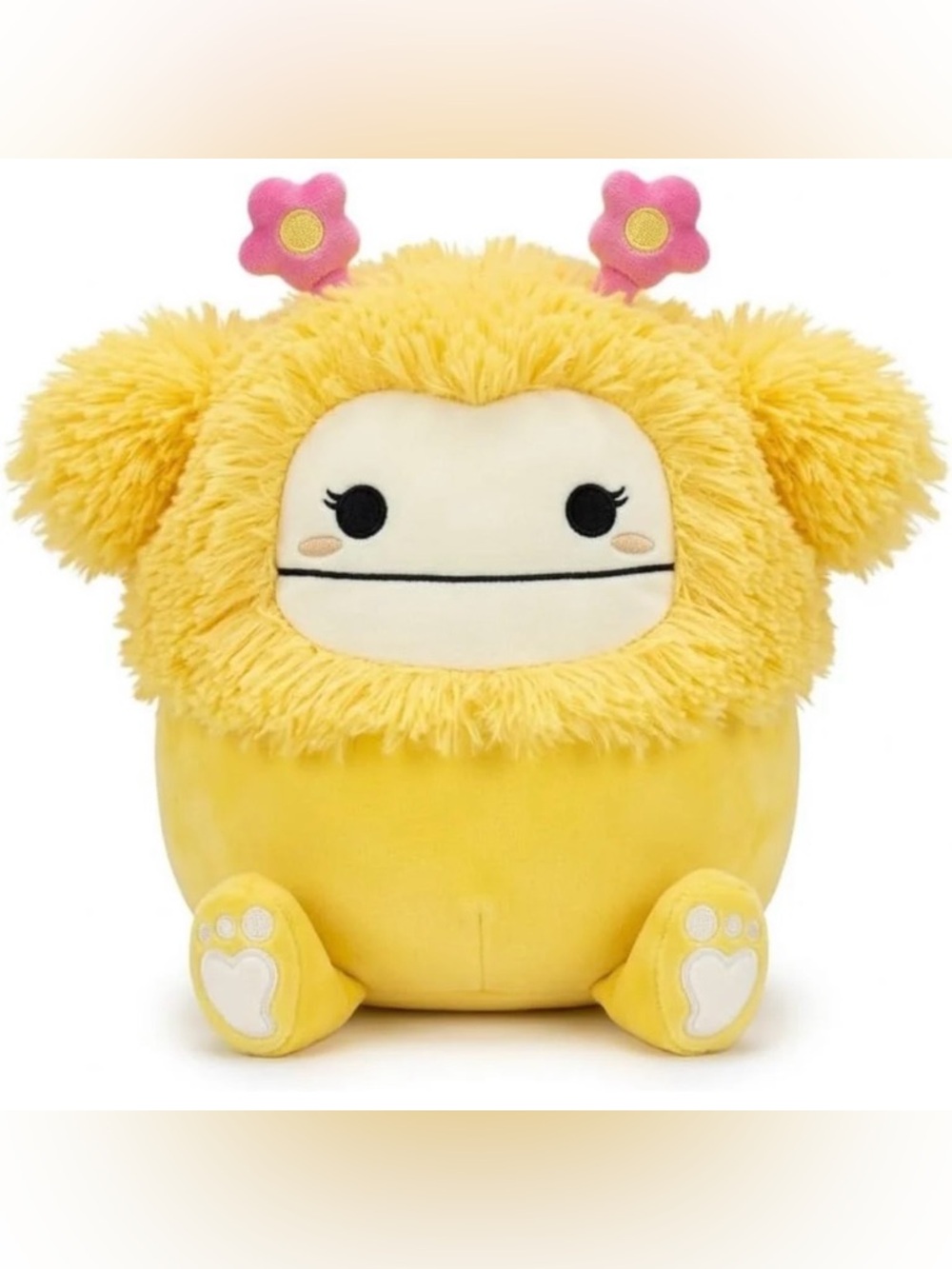 Squishmallows 8” Nomi Plush, Yellow Bigfoot, Fuzzy Hair with Pink Flower Accents